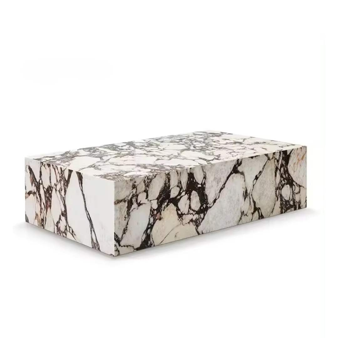 A Calcutta Viola Marble Coffee Table featuring a black and white veined pattern.