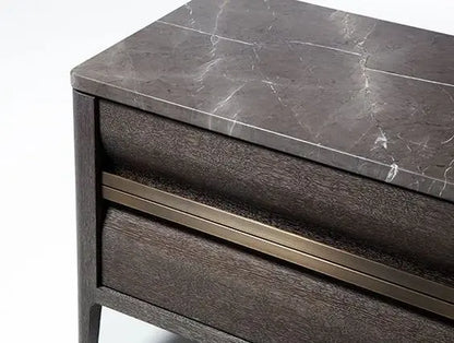 Close-up of an Empire Night Stand Set of 2 with two drawers, featuring a dark marble top with light veining and a horizontal metal accent.