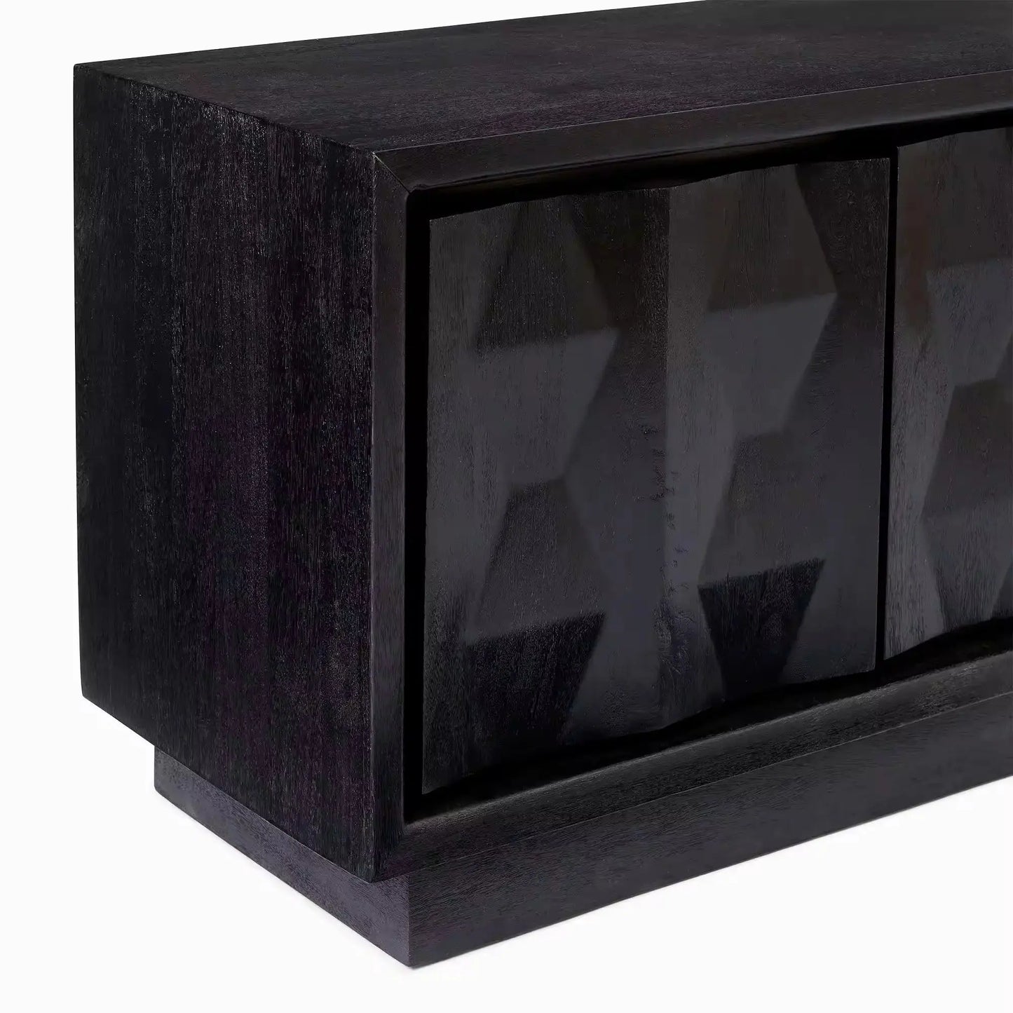 The Carved Pattern Black Media Console features dark wooden construction with a textured geometric pattern on its doors.