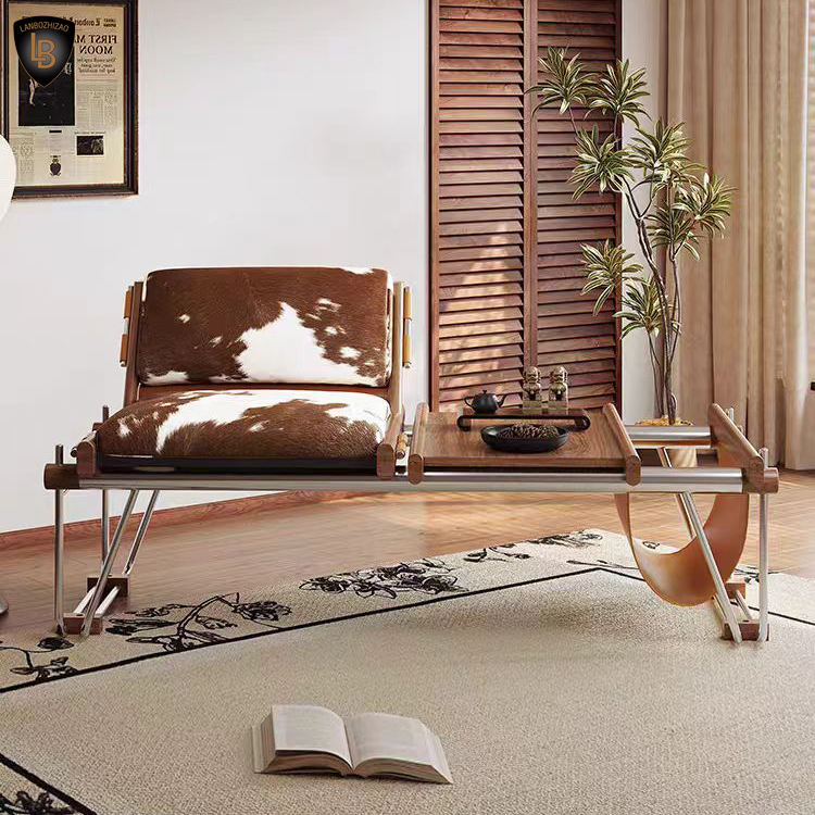 Ronan Cowhide Lounge Chair in Polished Steel - Urban Ashram