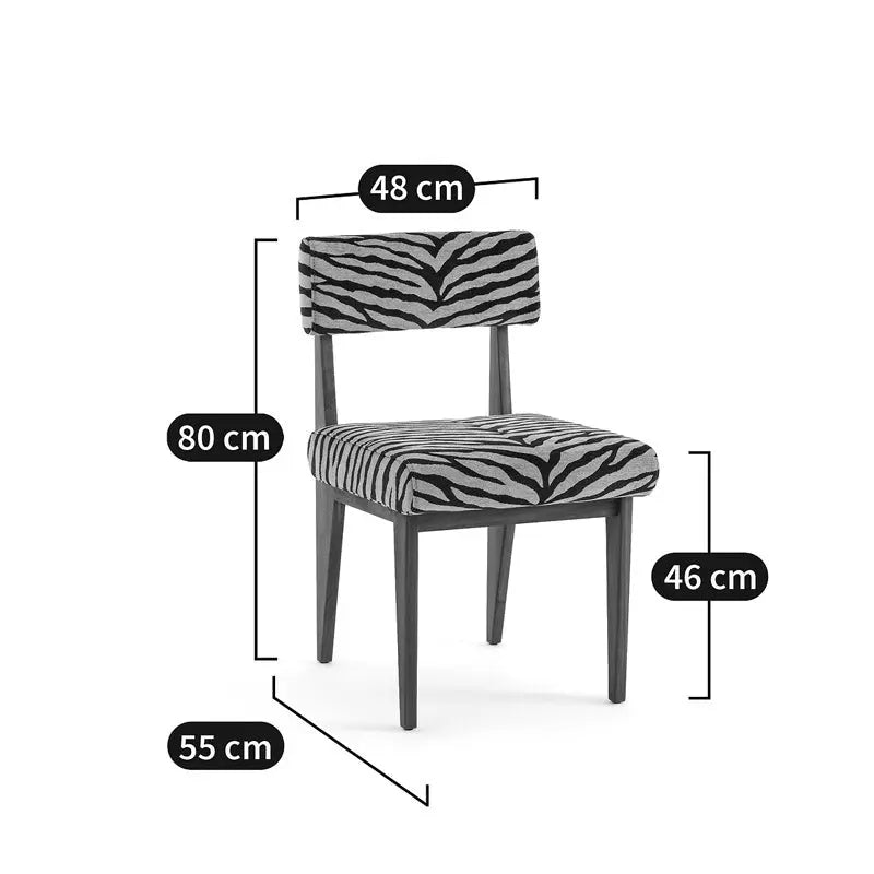 The Savannah Stripes Dining Chair features a zebra print fabric cover and has dimensions of 80 cm in height, 48 cm in width, a seat height of 46 cm, and a depth of 55 cm.